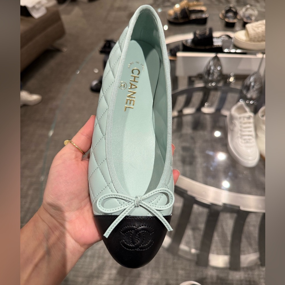 CHANEL Light Green Quilted Flats with Black Toe